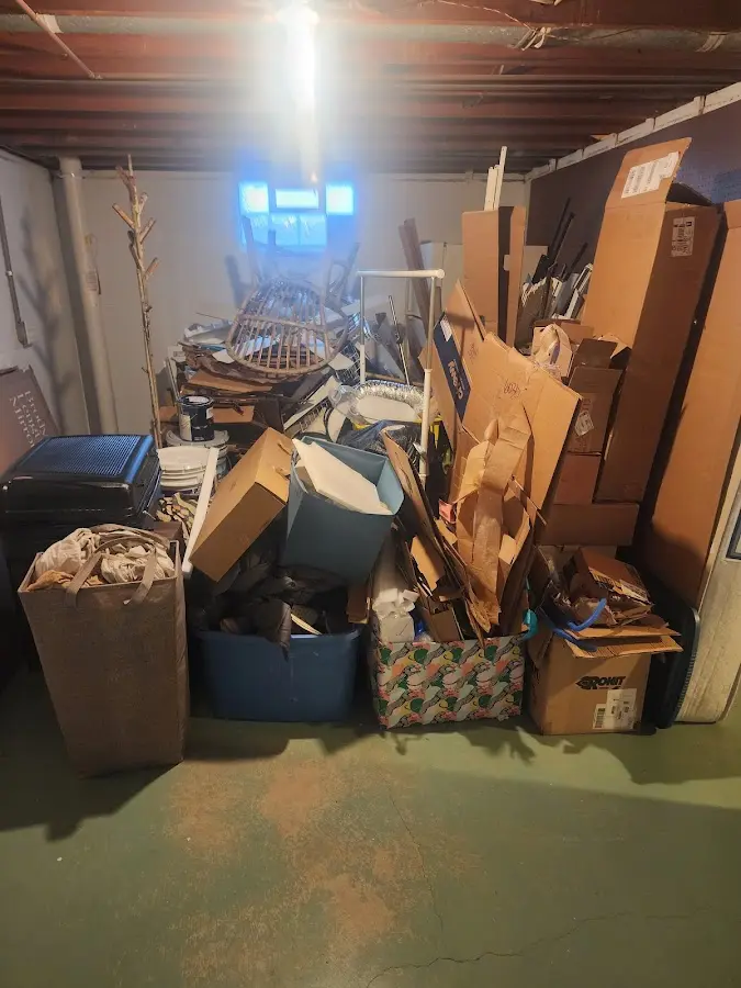 Roll-off dumpster container at job site for Construction Dumpster Rental in Hill 'n Dale